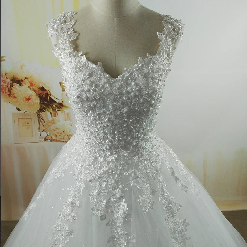 Customized Ball Gown Bridal Dress with Pearls and Tulle