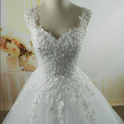 Customized Ball Gown Bridal Dress with Pearls and Tulle