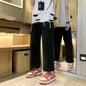 Washed Denim Trousers for Men with Micro-Flared Style