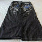 Washed Denim Trousers for Men with Micro-Flared Style
